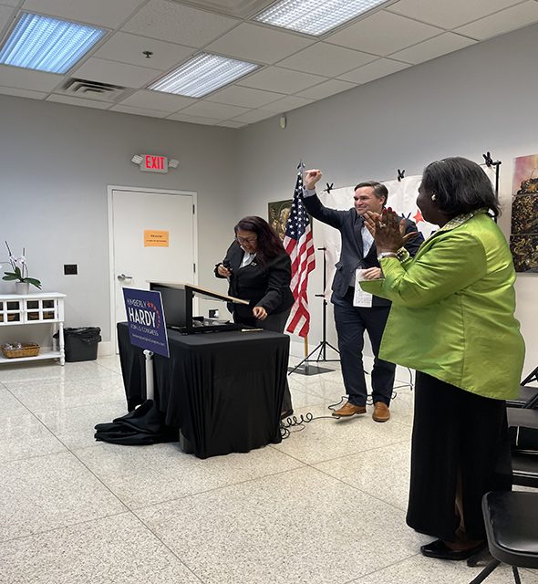 democrat-candidate-giving-a -victorious-gesture